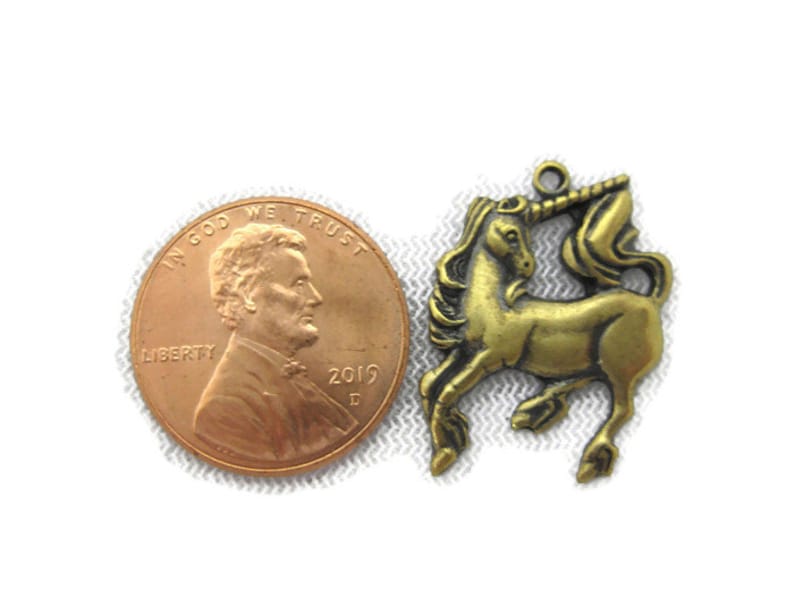 2 pieces Antiqued Brass Vintage Design Unicorn Charm with Ring Made in the USA