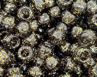 Golden Glitz: Black Pony Beads with Sparkling Gold Glitter