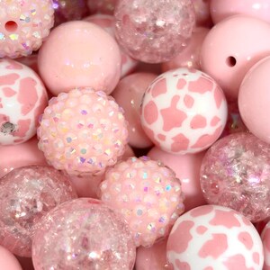 Assorted 20mm chunky light pink beads, perfect for bold and stylish jewelry making and crafting projects.