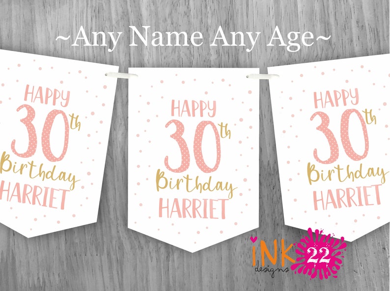 May include: A pink and gold birthday banner with the text "Happy 30th Birthday Harriet". The banner is decorated with white polka dots.