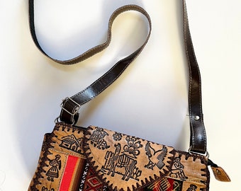 Crossbody Hand Carved Leather Purse with Andean Textile. Peruvian hand crafted Purse with genuine leather and llama design.