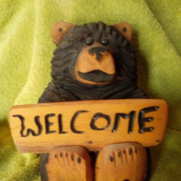 Hand carved Chain saw brown bear cub wood art holding welcome sign