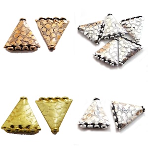 May include: Set of six triangle-shaped metal beads with a textured surface. The beads are available in gold, silver, and copper tones.