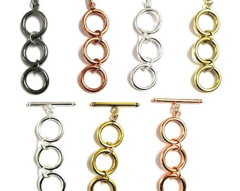 May include: Six toggle clasps with three rings each. The clasps are available in six different finishes: black, copper, silver, gold, rose gold, and nickel.
