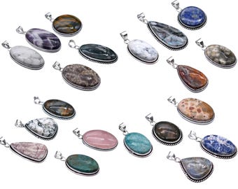 May include: A collection of gemstone pendants in various shapes and colors, including oval, teardrop, and round. Each pendant has a silver-colored bail. The gemstones feature a range of colors and patterns, such as blue, pink, green, and brown.