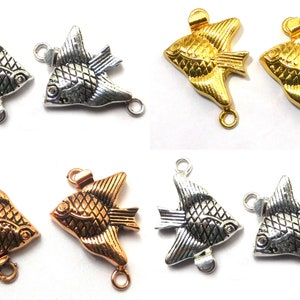 May include: Six silver, gold, and copper-toned fish-shaped metal connector charms. Each charm has a loop on either end for attaching to jewelry or other crafts.