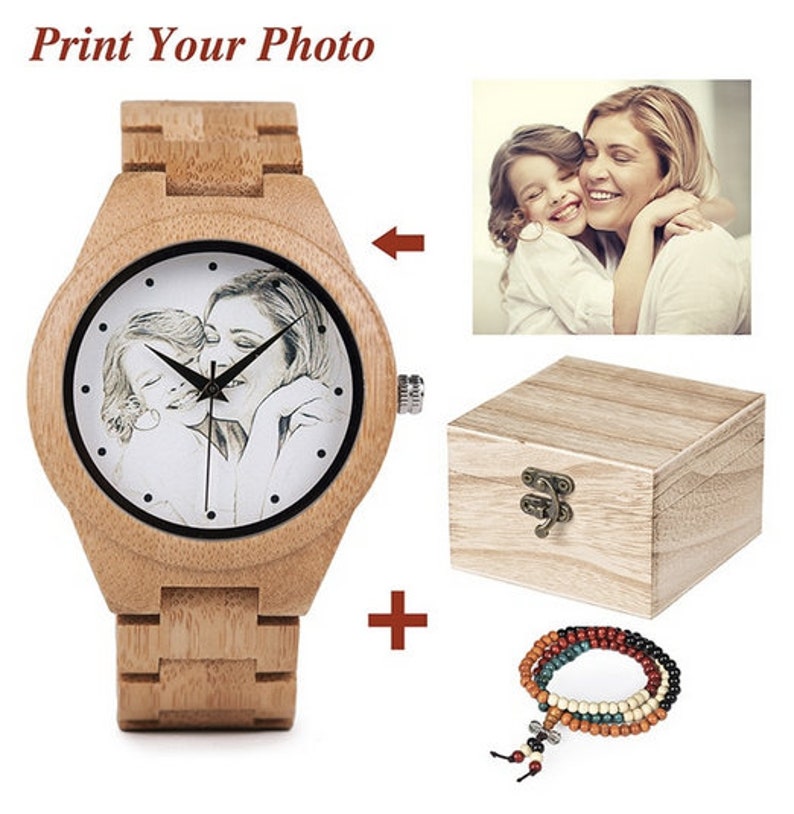 May include: A wooden wristwatch with a white face and a black and white photo of two people printed on it. The watch comes with a wooden box and a beaded bracelet.