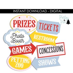 May include: A collection of colorful carnival-themed signs with text including "Prizes," "Tickets," "Photo Booth," "Games," "Concessions," "Petting Zoo," "Restroom," and "Shows." The signs are in various shapes and colors, with a white background.