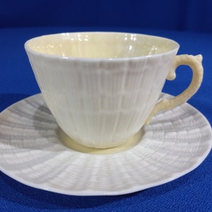 Flat Cup & Saucer Set Limpet Yellow by BELLEEK POTTERY (IRELAND)