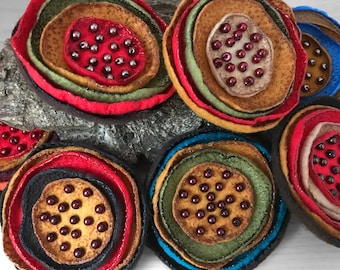 Felt brooch in autumn colours, teal, brown, mustard, green, blue, orange
