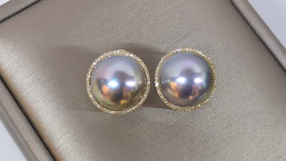 pearl earrings with diamonds around