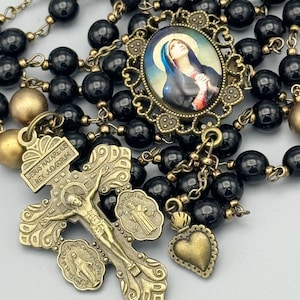 Our Lady of Sorrows Mater Dolors Our Lady of Dolours the Sorrowful Mother of Sorrows Mater Dolorosa OL of Piety Seven Sorrows Seven Dolours