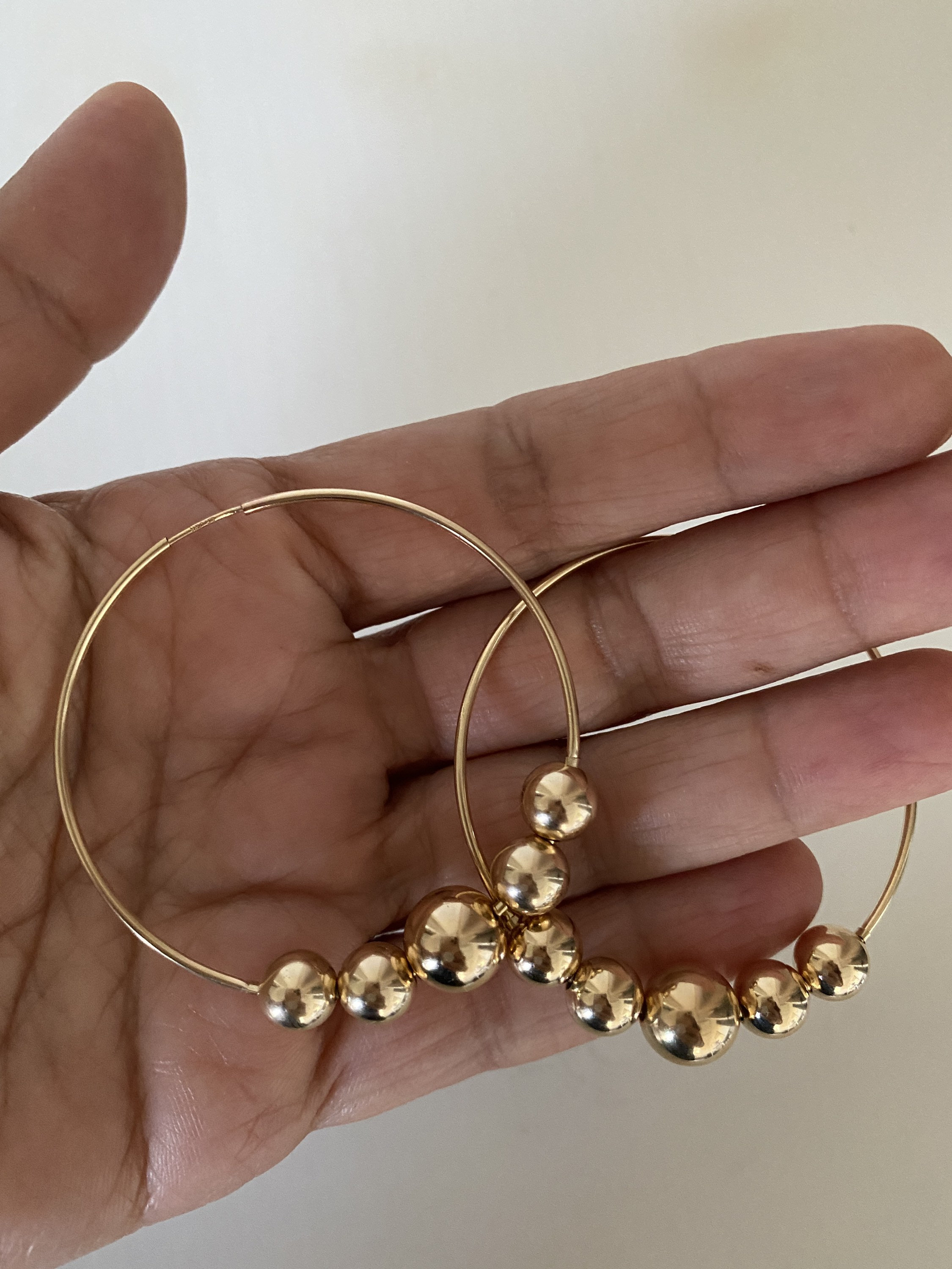 gold hoops with diamond balls