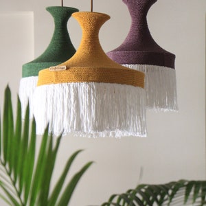 Artisan crochet ceiling lampshade used as overhead lighting