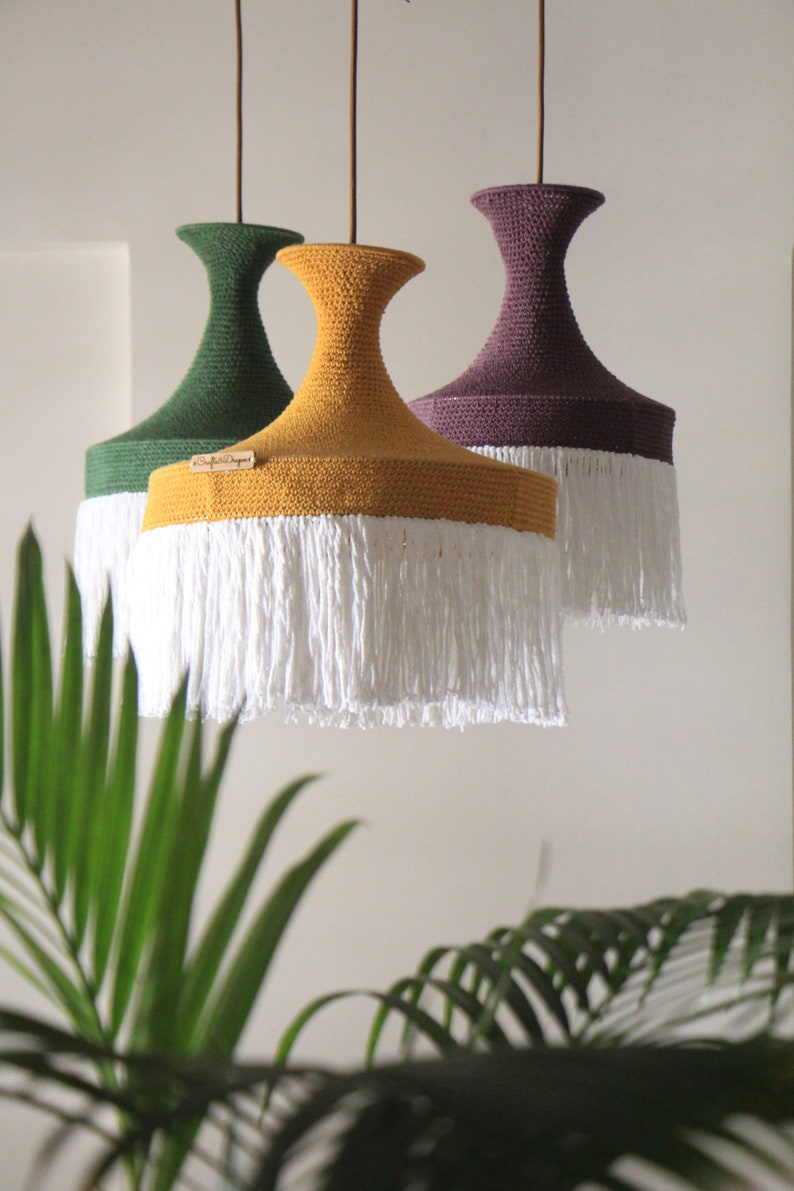Artisan crochet ceiling lampshade used as overhead lighting