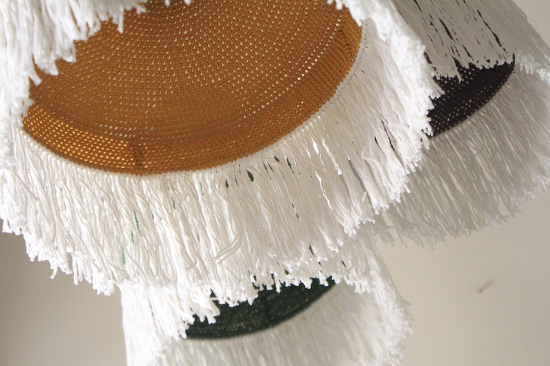 Crochet ceiling light shade styled with minimalist home décor