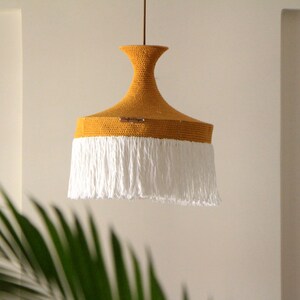 Handmade crochet hanglamp styled as a ceiling fixture
