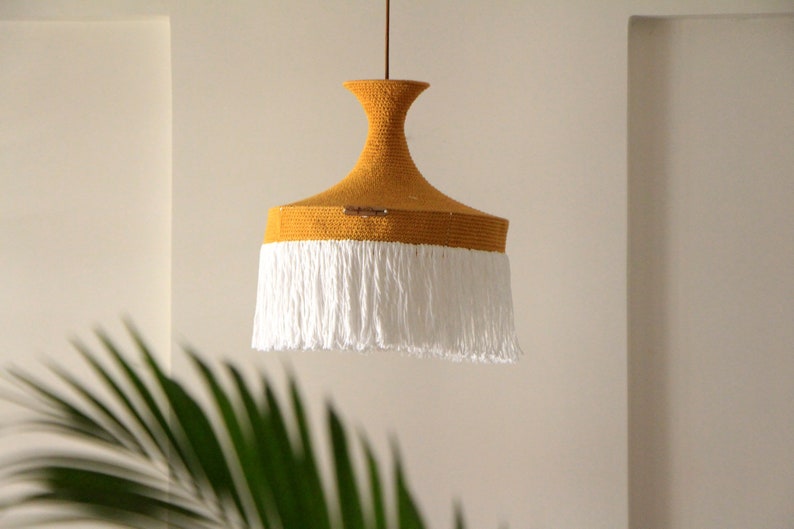 Handmade crochet hanglamp styled as a ceiling fixture