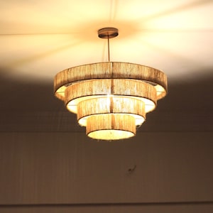 Handmade macrame light pendant with coastal-style lampshade, sustainable home lighting