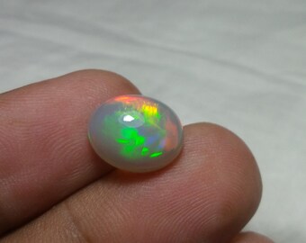 3.24 Carat 12.5x10.2x5.7 MM Natural Top Grade Green Red Yellow Rainbow Fire Ethiopian Opal Oval Shape Cabochon,Multi Fire Welo Opal Stone 3.24 Carat 12.5x10.2x5.7 MM Natural Top Grade Green Red Yellow Rainbow Fire Ethiopian Opal Oval Shape Cabochon,Multi Fire Welo Opal Stone