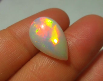3.24 Carat 12.5x10.2x5.7 MM Natural Top Grade Green Red Yellow Rainbow Fire Ethiopian Opal Oval Shape Cabochon,Multi Fire Welo Opal Stone 3.24 Carat 12.5x10.2x5.7 MM Natural Top Grade Green Red Yellow Rainbow Fire Ethiopian Opal Oval Shape Cabochon,Multi Fire Welo Opal Stone