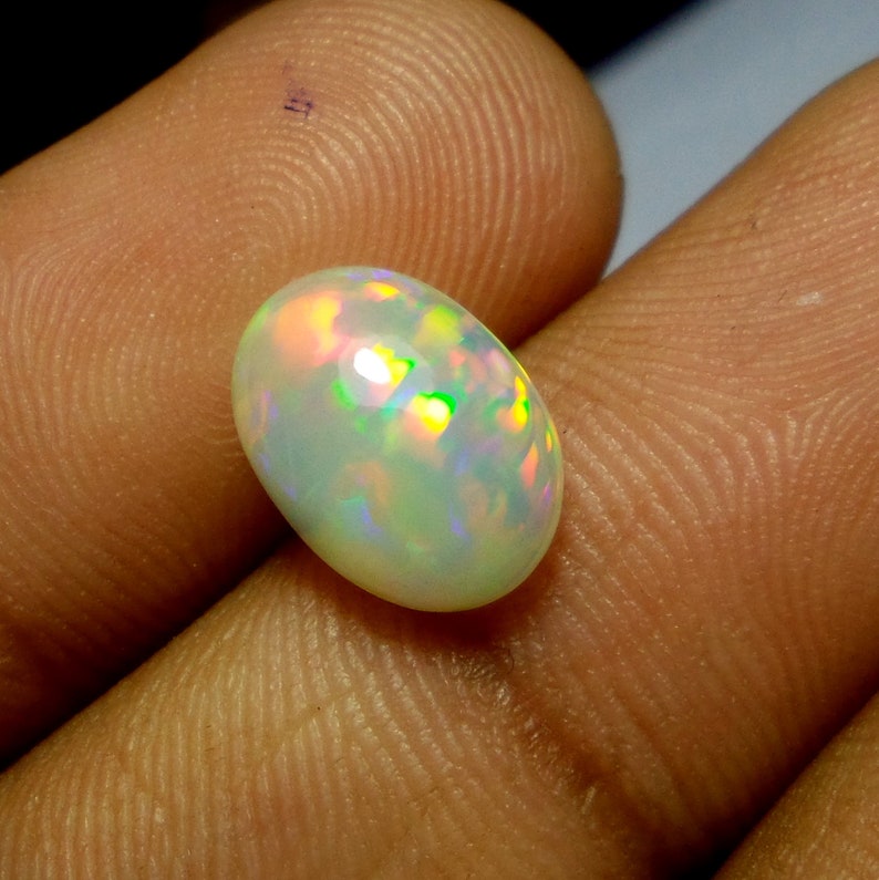 2.7 Carat 11.7x8.7x5.2 MM Natural Ethiopian Welo Fire Opal Oval Shape Cabochon Opal Loose Gemstone