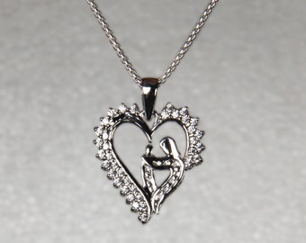 925 Sterling Silver Two Connected Love Hearts Round cut CZ Ladies Pendant Charm 3.82 Grams 0.41 Ct BLPD4