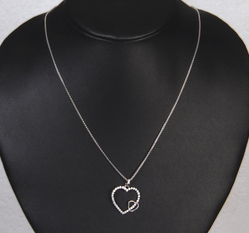 925 Sterling Silver Two Connected Love Hearts Round cut CZ Ladies Pendant Charm 3.82 Grams 0.41 Ct BLPD4