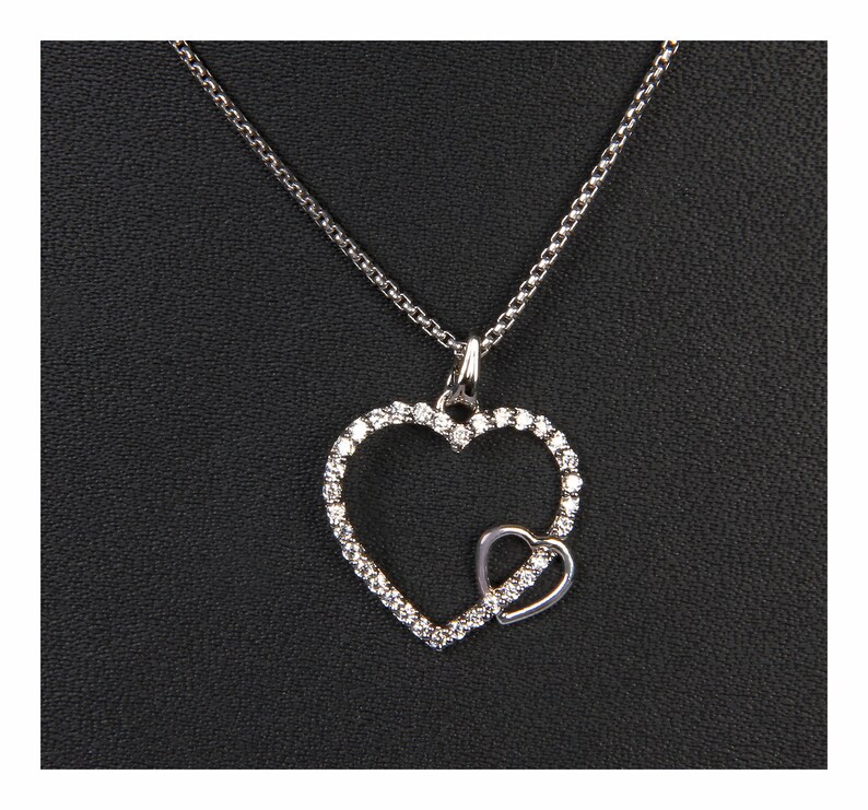 925 Sterling Silver Two Connected Love Hearts Round cut CZ Ladies Pendant Charm 3.82 Grams 0.41 Ct BLPD4