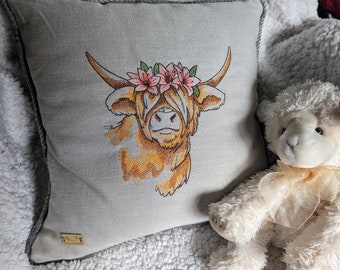 Embroidered piped scatter cushions