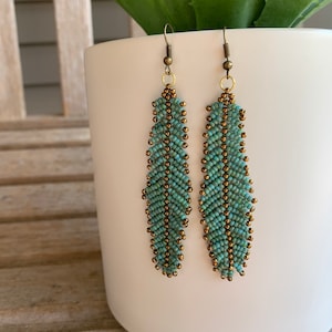 Seafoam green feather earrings with Miyuki beads