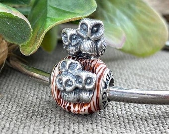 Family of owls. Dagaz jewerly. JUMA. Handmade carvings on ivory Sterling silver.