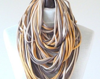 knitted necklace nude strings infinity