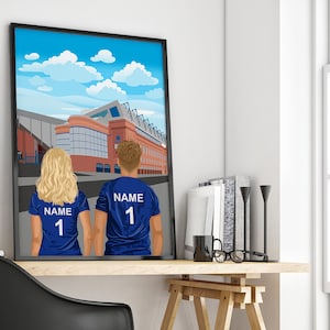 May include: A digital illustration of a couple wearing blue jerseys with the number "1" and the word "NAME" on the back. They are standing in front of a stadium with a blue sky and white clouds in the background.