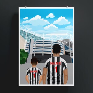 May include: Two people wearing black and white striped soccer jerseys with the word "NAME" and the number "1" on the back. They are standing in front of a soccer stadium.
