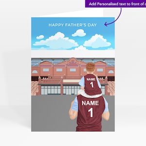May include: A father and son wearing matching maroon and blue jerseys with the number "1" on the back. The son is sitting on the father's shoulders. They are standing in front of a brick building with a blue sky and white clouds in the background. The text "Happy Father's Day" is written in the sky.