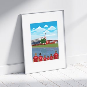 May include: A framed illustration of a soccer team standing in front of a stadium with a blue sky and white clouds in the background. The team is wearing red jerseys with the number 1 on the back. The stadium is red and white with a green field.