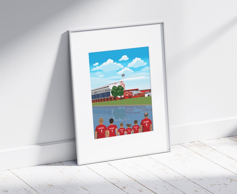 May include: A framed illustration of a soccer team standing in front of a stadium with a blue sky and white clouds in the background. The team is wearing red jerseys with the number 1 on the back. The stadium is red and white with a green field.