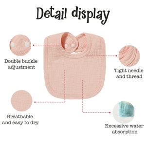 May include: A pink baby bib with adjustable double buckle closures. The bib is made of a soft, breathable fabric with a textured surface. The bib is designed for easy drying and has excellent water absorption.