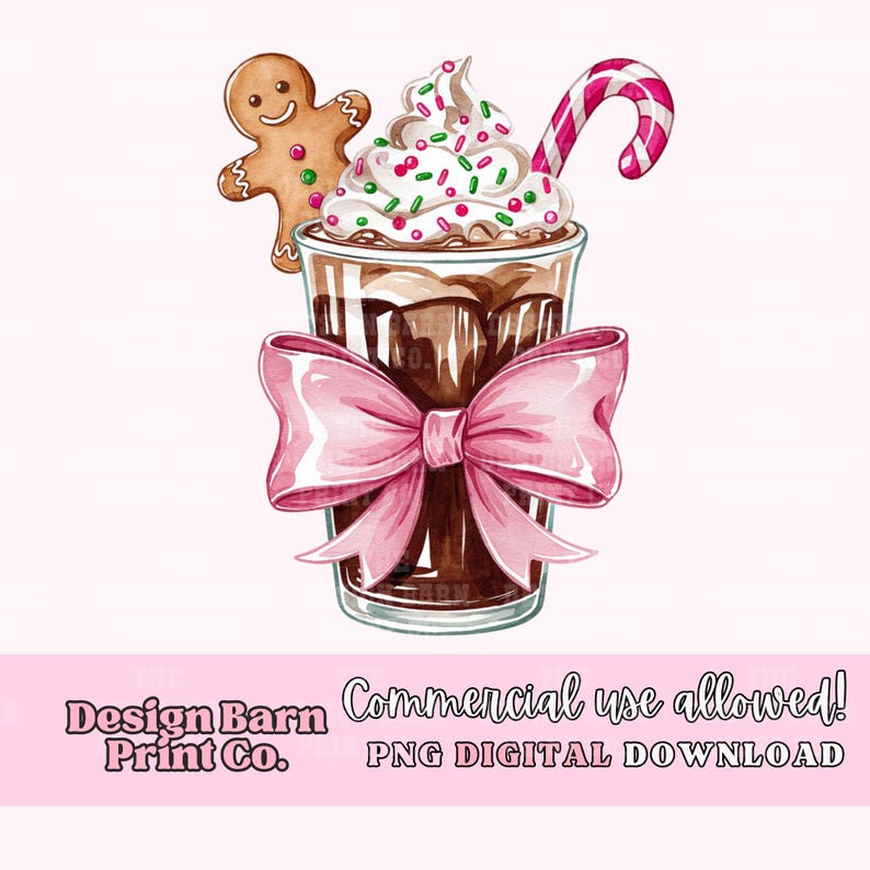 K&ouml;nnte beinhalten: Eine Aquarell-Illustration eines Schokoladengetr&auml;nks mit Schlagsahne, Streuseln und einem Zuckerstangen. Ein Lebkuchen sitzt am Rand des Glases. Eine rosafarbene Schleife ist um das Glas gebunden. Der Text "Design Barn Print Co." befindet sich am unteren Rand des Bildes.