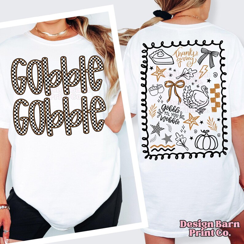 May include: White t-shirt with the words "Gobble Gobble" in a brown and black checkered pattern. The back of the shirt features Thanksgiving-themed graphics, including a turkey, pumpkin, and the phrase "Gobble til you Wobble."