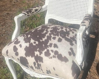 CUSTOM ORDER, Designer accent chair, refinished, painted with zebra stamped  cowhide upholstered seat, rattan backing.
