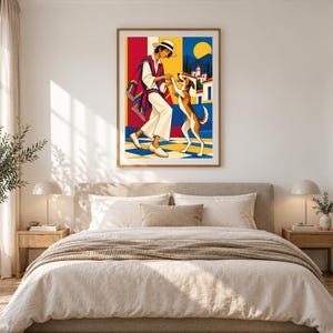 May include: A framed wall art print featuring a colorful illustration of a person wearing a wide-brimmed hat and a striped poncho, interacting with a brown and white dog. The scene includes a yellow sun, blue mountains, and white buildings.