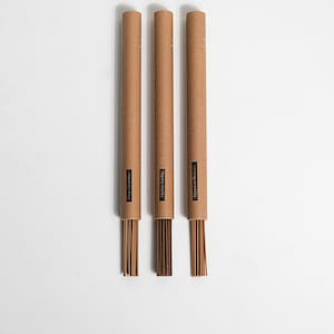 May include: Three brown cardboard tubes containing incense sticks. The tubes are labelled "Juniper Berry", "Sage & Cedar", and "Mountain Blossom".