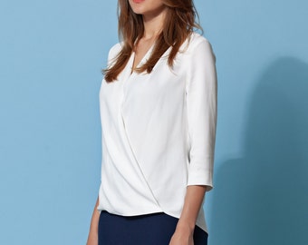 White blouse deep with deep V neck white