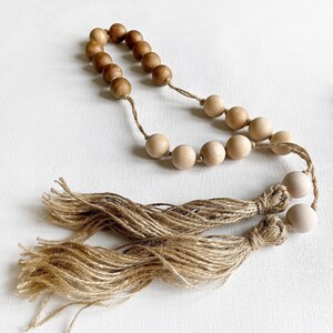 Oversized wooden bead garland with whitewashed, natural and stained wood; Long tassel beads for coffee table; Extra large beaded centerpiece