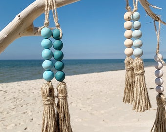 Decoración playera: Guirnalda de cuentas de madera color turquesa con borla de yute, juego de 5