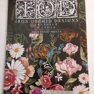 May include: Iron Orchid Designs Transfer Wander, a pack of four 12x16 inch sheets featuring a floral design with roses, daisies, and other flowers on a black background.