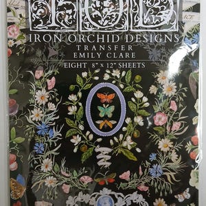 May include: A black sheet of Iron Orchid Designs transfer paper, 8" x 12", featuring floral and butterfly designs. The text "IRON ORCHID DESIGNS TRANSFER EMILY CLARE" is visible, along with the words "HOME SWEET LOVE".
