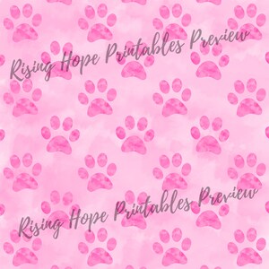 May include: A seamless pattern featuring pink watercolor paw prints on a light pink background. The text "Rising Hope Printables Preview" is visible in the image.